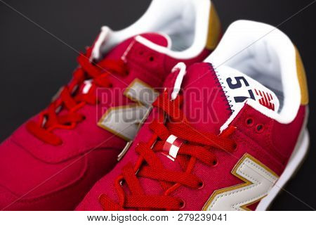 Boston, Ma, Usa, January 2019 - New Balance Nb 574 Athletic Shoes On Studio Background. New Balance 