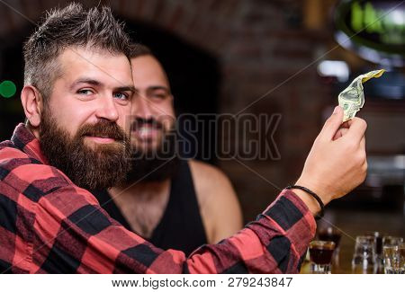Hipster Brutal Bearded Man Spend Leisure With Friend At Bar Counter. Order Drinks At Bar Counter. Me