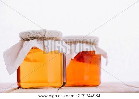 Selective Focus Of Bottled Natural Kombucha Mushroom With Tea In Jars Isolated On White