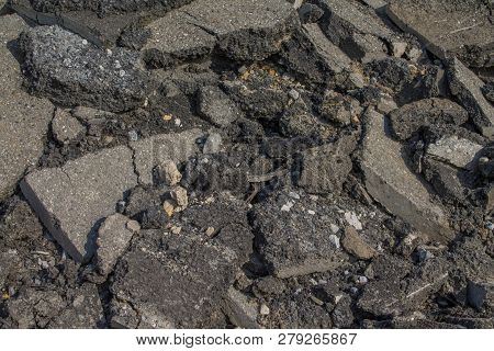 A Pile Of Broken Asphalt Background Texture.