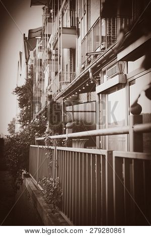 View At Modern Buildings With Balcony In Central Bremen, Germnay . Image In Sepia Color Style
