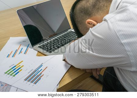 Young Stressed Business Man Feeling Strain In Eyes After Working For Long Hours On Computer.