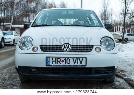 Miercurea Ciuc, Romania- 19 January 2019: White Volkswagen Lupo Front View.