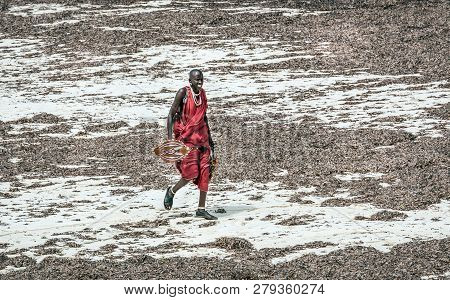 Diani Beach, Kenya - October 14, 2018: Unindentified African Man Wearing Traditional Masai Clothes O