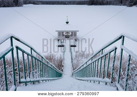 Winters Chapel On A Frozen Lake In Russia