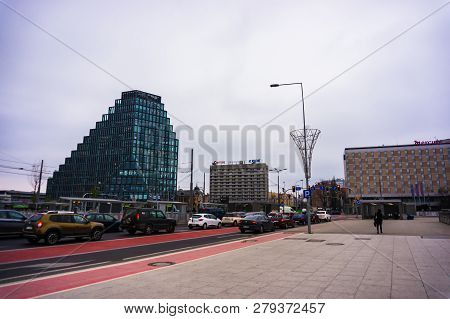 Poznan, Poland - November 21, 2018: Row Of Cars Waiting In Front Of Traffic Lights At A Intersection