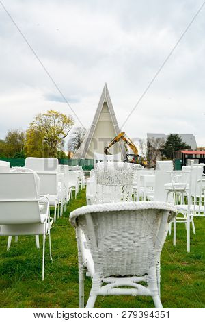 Christchurch, New Zealand - October 10 2018; 185 Empty White Chairs Of Remembrance With Symbols Of C