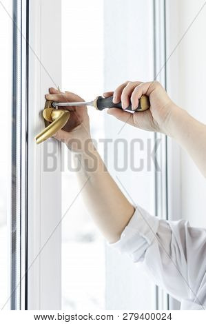 Gold Pen. Fasten The Window Handle Screw To The Pvc Window