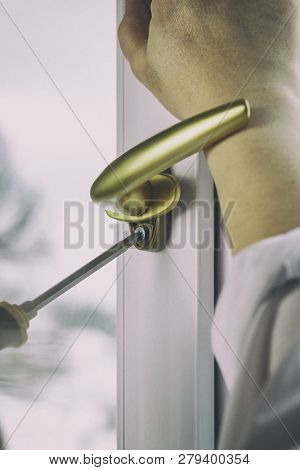 Gold Pen. Fasten The Window Handle Screw To The Pvc Window