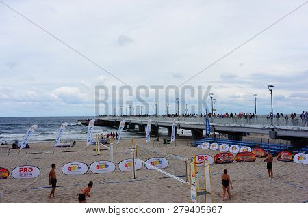 Kolobrzeg, Poland - August 10, 2018: Volleyball Area On A Beach Close To A Large Pier At The Seaside
