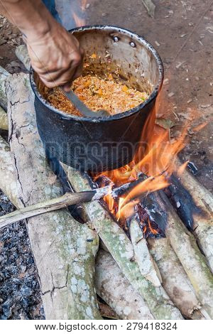 Cooking On A Fire In A Jungle Of Madidi National Park, Bolivia