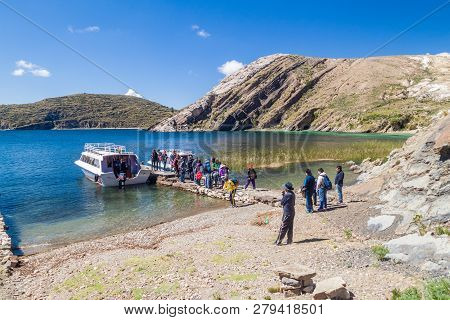 Isla Del Sol, Bolivia - May 12, 2015: Tourists At A Pier In Challa Village On Isla Del Sol Island Of