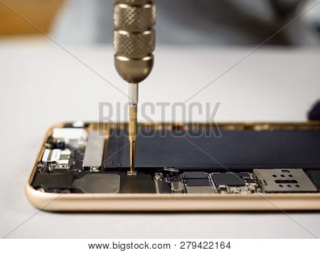 Technician Or Engineer Disassembling Components Broken Smartphone For Repair Or Replace New Part On 