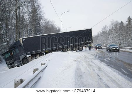 Leningrad Region, Russia - March 21, 2018: Mercedes-benz Axor 1836 With Trailer In A Ditch In March 