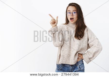 Impressed Excited And Surprised Attractive 20s Woman In Glasses And Warm Sweater Drop Jaw From Amaze