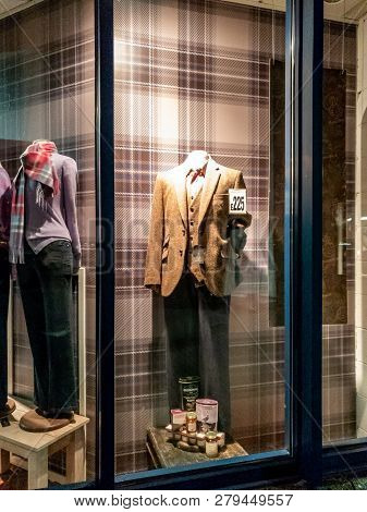 Oban, Scotland - October 07, 2018: Traditional Tweed Dress With Other Gifts And Accessories In The W