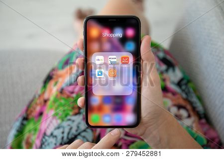 Alushta, Russia - September 27, 2018: Woman Holding Iphone X With Top Internet Shopping Service On T
