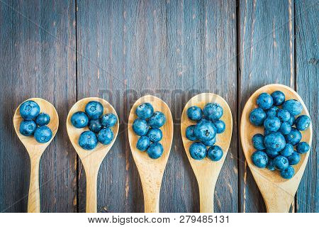 Blueberry Spoon On Wooden Background - Vintage Effect Style Pictures