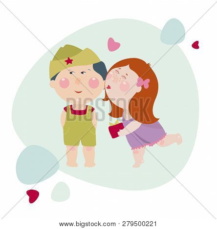 Girl Kisses A Boy And Gives A Present To Him. Girl Congrats A Boy In The Military Uniform. Cute Chil