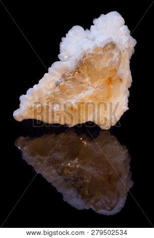 Natural Druse Of White Calcite On A Black Background With Reflection