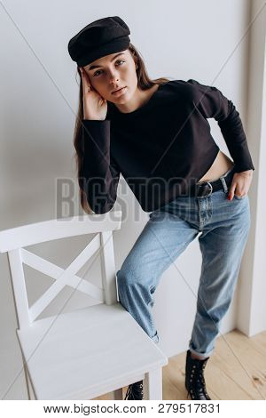 Beautiful Girl In A Black Cap, Black Golf, Blue Jeans! Natural Light, Smart Casua, Street Casual