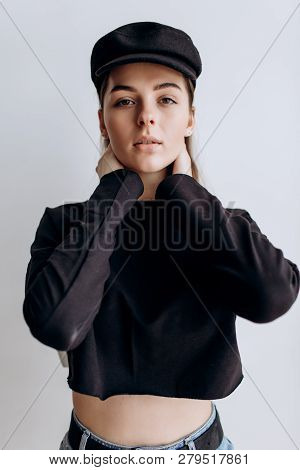 Beautiful Girl In A Black Cap, Black Golf, Blue Jeans! Natural Light, Smart Casua, Street Casual