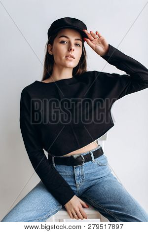 Beautiful Girl In A Black Cap, Black Golf, Blue Jeans! Natural Light, Smart Casua, Street Casual