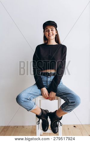Beautiful Girl In A Black Cap, Black Golf, Blue Jeans! Natural Light, Smart Casua, Street Casual