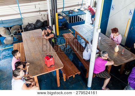 Amazon, Brazil - June 30, 2015: Passengers In A Dining Hall Of A River Boat Which Plies River Amazon