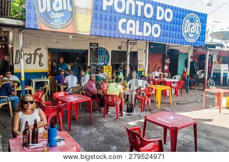 Macapa, Brazil - July 31, 2015: People Sit In An Outdoor Pub In Macapa, Brazil