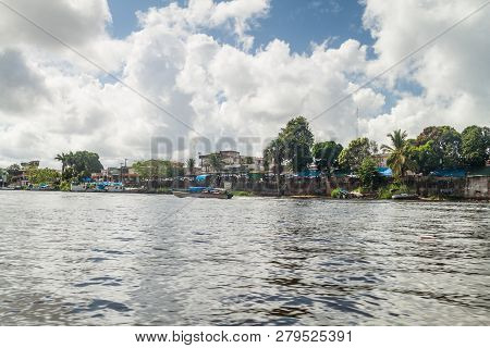 Oiapoque, Brazil - August 1, 2015: Small Boats On Oiapok Oiapoque Or Oyapock River In Oiapoque Town.