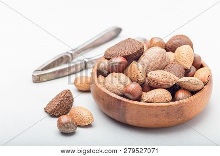 Different Kinds Of Nuts In The Shell: Hazelnut, Walnut, Almond And Brazil Nuts In The Bowl With Nut 
