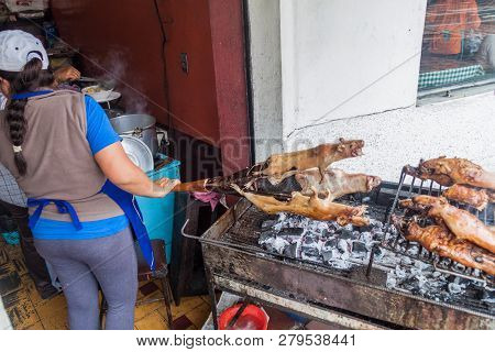 Banos, Ecuador - June 20, 2015: Roasted Guinea Pigs On A Market In Banos De Agua Santa, Popular Tour
