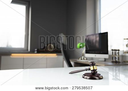 Lawyers Office. Gavel And Computer On The White Table.