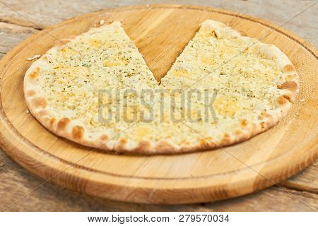 Spicy Cheese Pizza With Removed Slice. Lack Of One Sixth Of Pizza. Five Sixth Of Pizza.