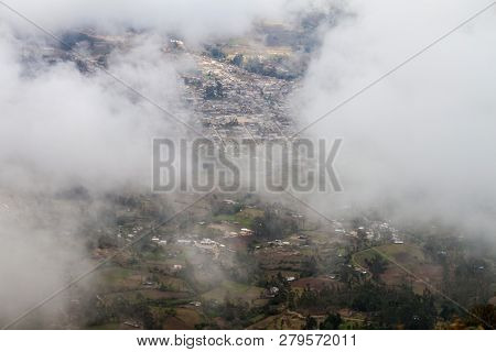 Aerial View Of Celendin Through The Clouds, Peru