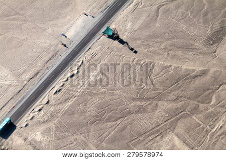 Aerial View Of Geoglyphs Near Nazca - Famous Nazca Lines, Peru. In The Center, Tree Figure Is Presen
