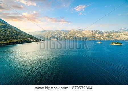 The Sun Sets On Ostrvo Sveti Dorde, Or St. George Island, Alongside Our Lady Of The Rocks, Two Small