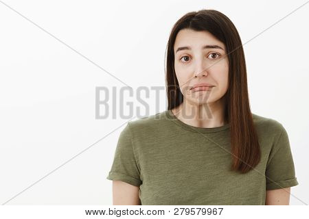Oops, Sorry. Portrait Of Insecure Guilty And Shy Cute Brunette Wobble Chin And Lower Lips, Making Sh
