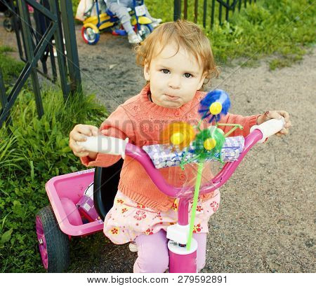 Little Girl With Mother Outside Walking At Playgarden, Lifestyle People Concept