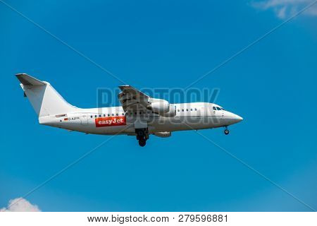 Zurich, Switzerland - July 19, 2018: EasyJet Airline Company airplane preparing for landing. EasyJet Airline Company Limited is a British low-cost carrier airline headquartered at London Luton Airport