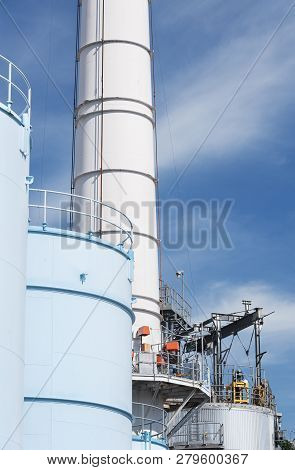 Oil Tank And Chimney In Chemical Factory