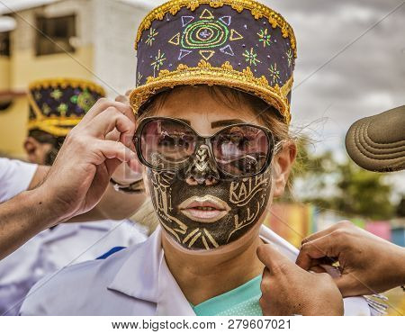 Latacunga, Ecuador - September 22, 2018 - Young Men Dress In Decorated Black Face To Celebrate Afric