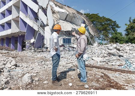 Engineer Architect And Worker Operation Control Demolish Old Building.