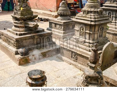 Fragment Of The Swayambhunath Temple Complex With Some Stone Statues And Other Details, Sacrificial 