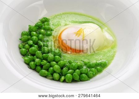 tear peas with poached egg, spanish basque cuisine