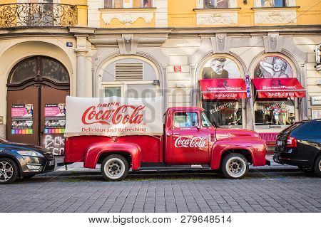 Prague, Czech Republic - June 7, 2017: : Red Retro Car Ford F-100 With Advertising Inscription Coca 