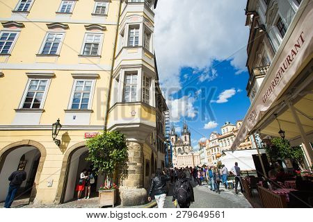 Prague, Czech Republic - June 7, 2017: Tourists Pass By Shops And Cafes In A Picturesque Section Of 