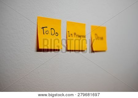 Monitor Task Of Work Concept, To Do, In Progress, Done Note Reminder Yellow Sticker Or Post Note On 