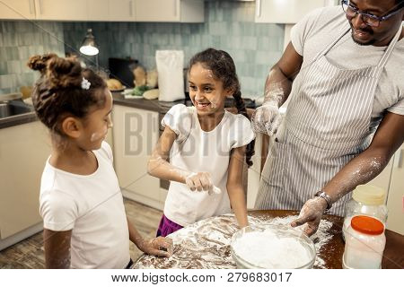 Cute Daughters Feeling Amazing And Involved In Cooking Pie